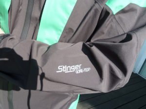 Tilak Stinger Jacket Logo